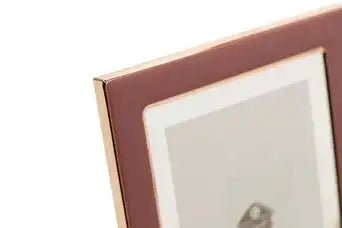 Cornice porta foto in metallo rosa