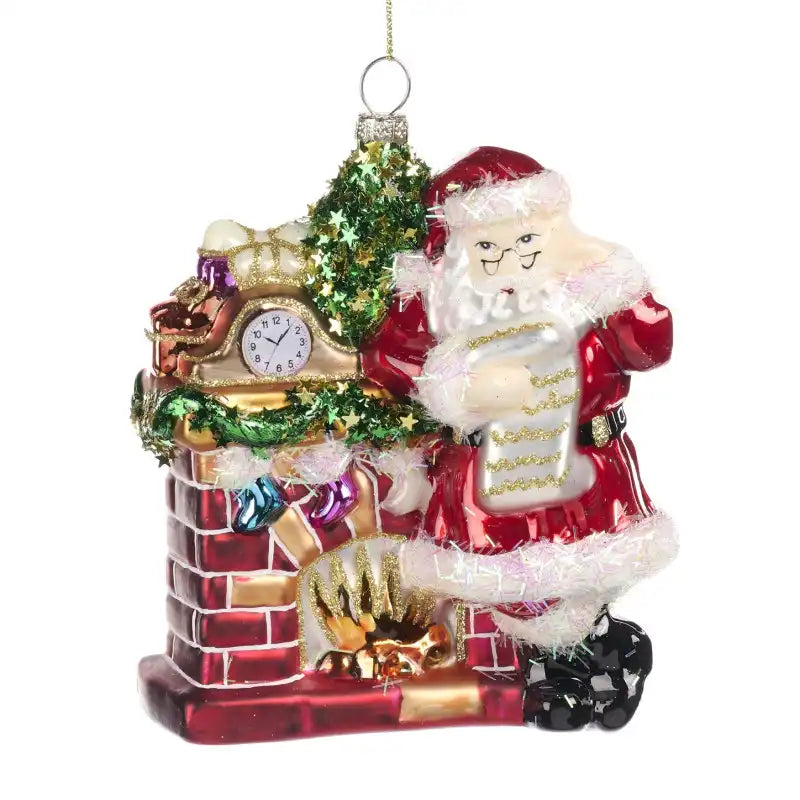 Babbo Natale in vetro con camino/orologio  H 14