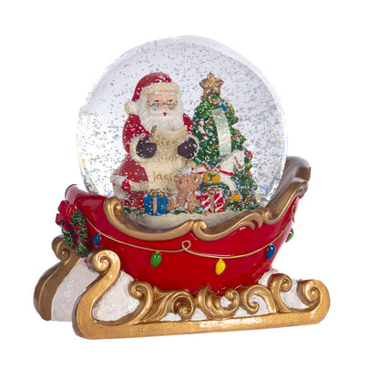 Globo di neve da tavolo con Babbo Natale sulla slitta musicale 17 cm