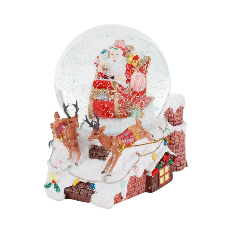 Globo di neve con Babbo Natale in slitta sul tetto, 17 cm